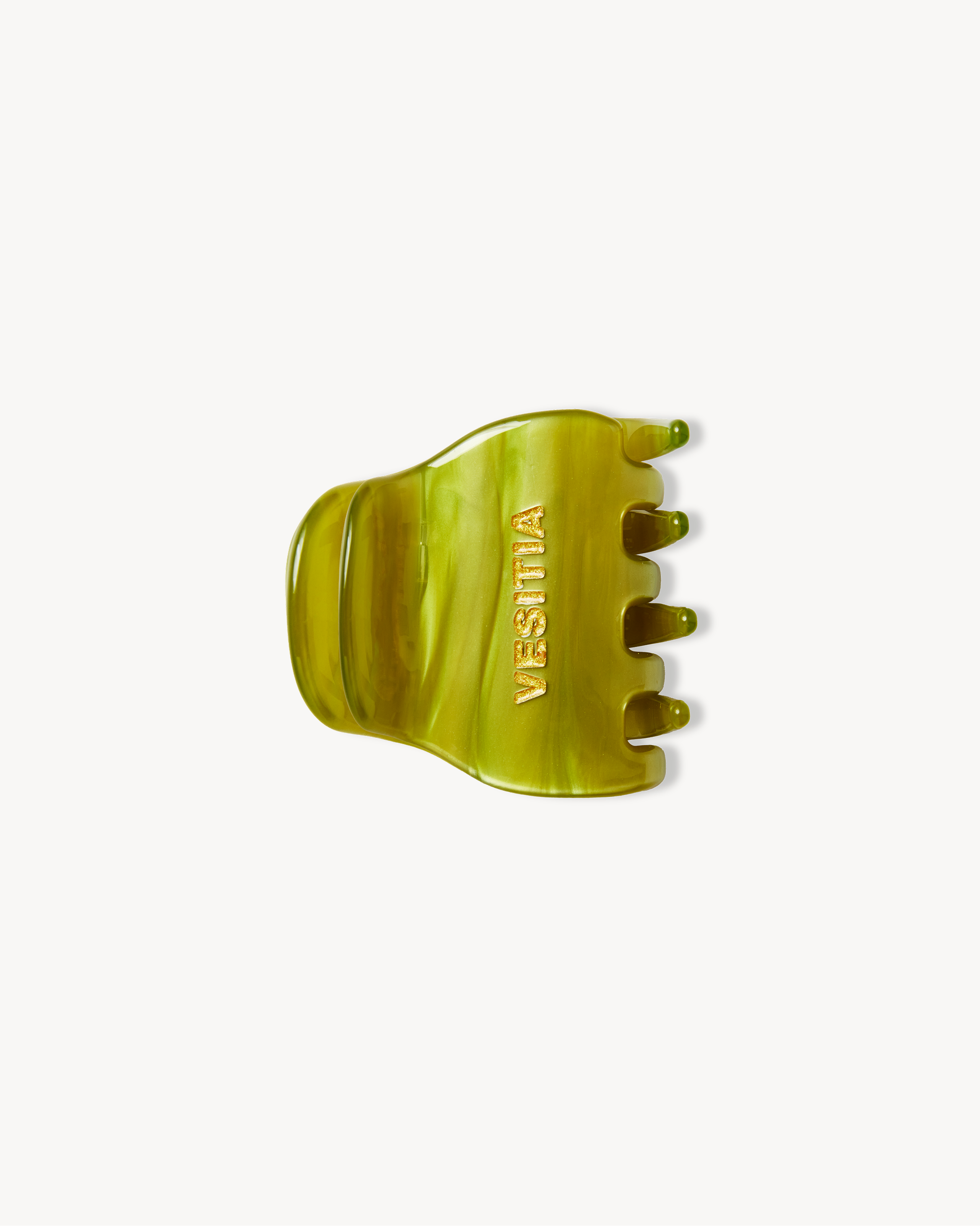 Green VESITIA midi claw clip on a white background