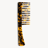 Tortoiseshell-patterned comb with 'VESITIA' branding on a white background