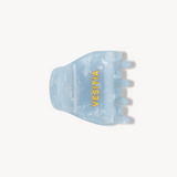 Blue hair clip with 'VESITIA' branding on a white background
