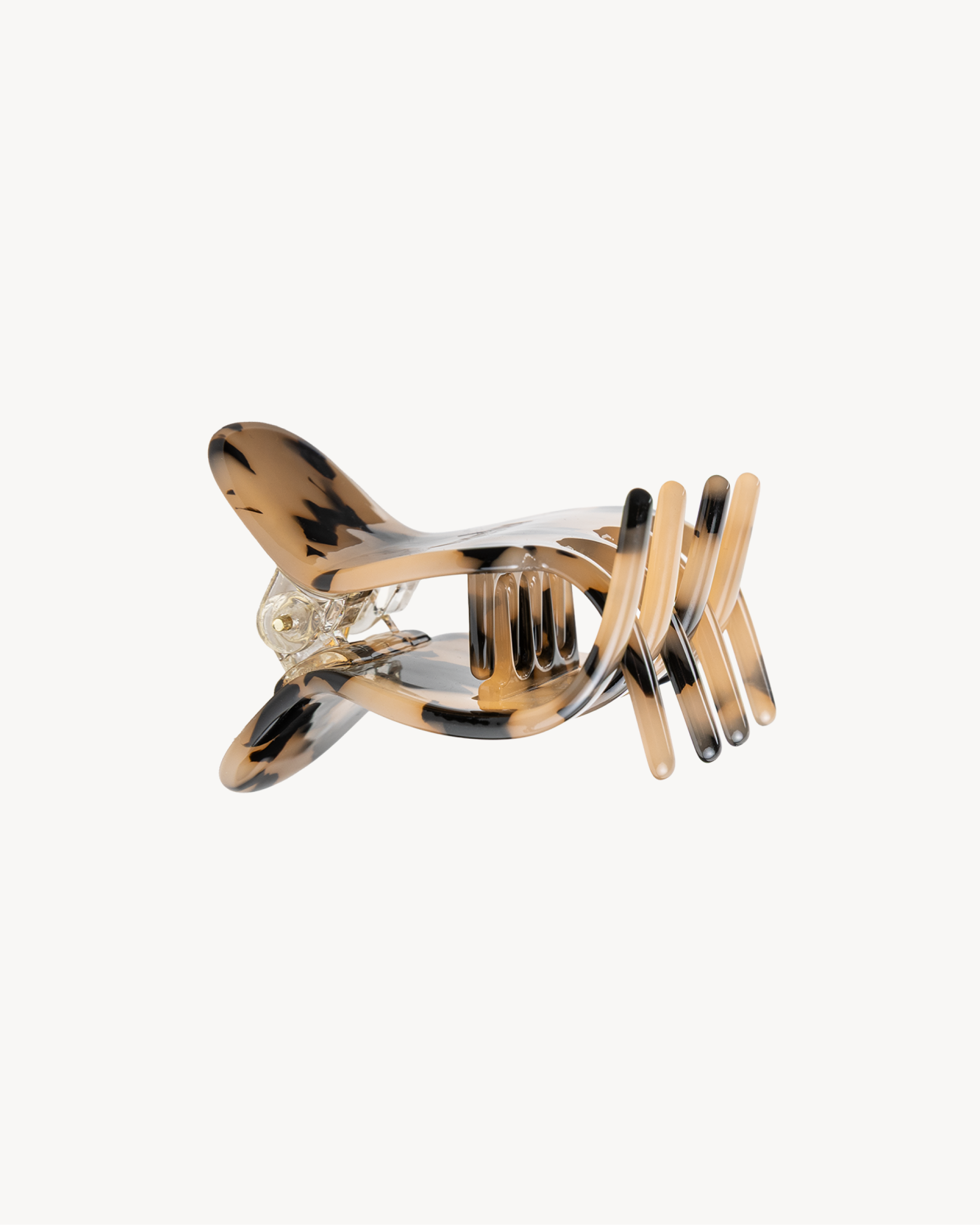 Tortoiseshell VESITIA midi claw clip on a white background