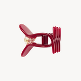 Red VESITIA midi claw clip on a white background