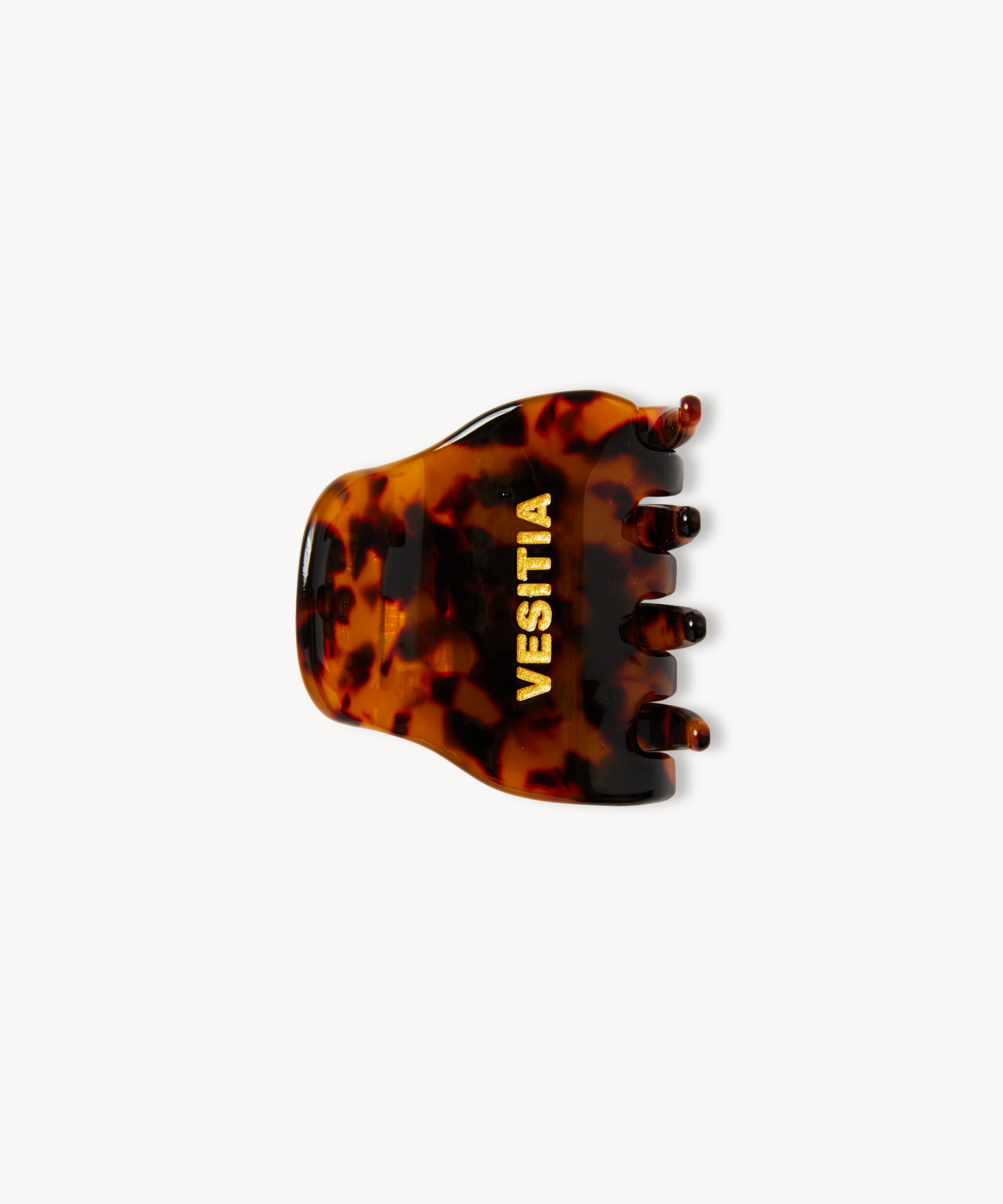 Tortoiseshell VESITIA midi claw clip on a white background
