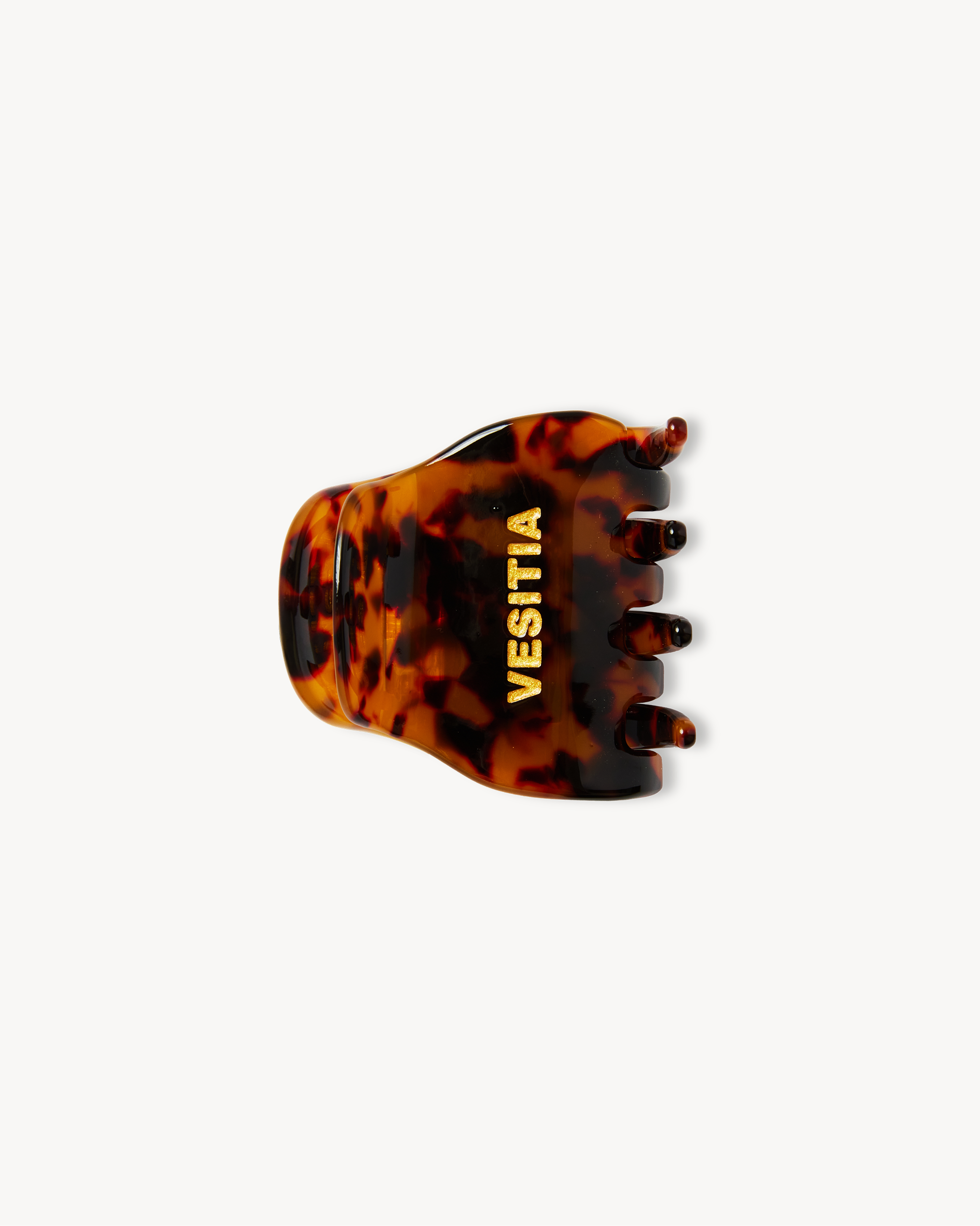 Tortoiseshell VESITIA midi claw clip on a white background