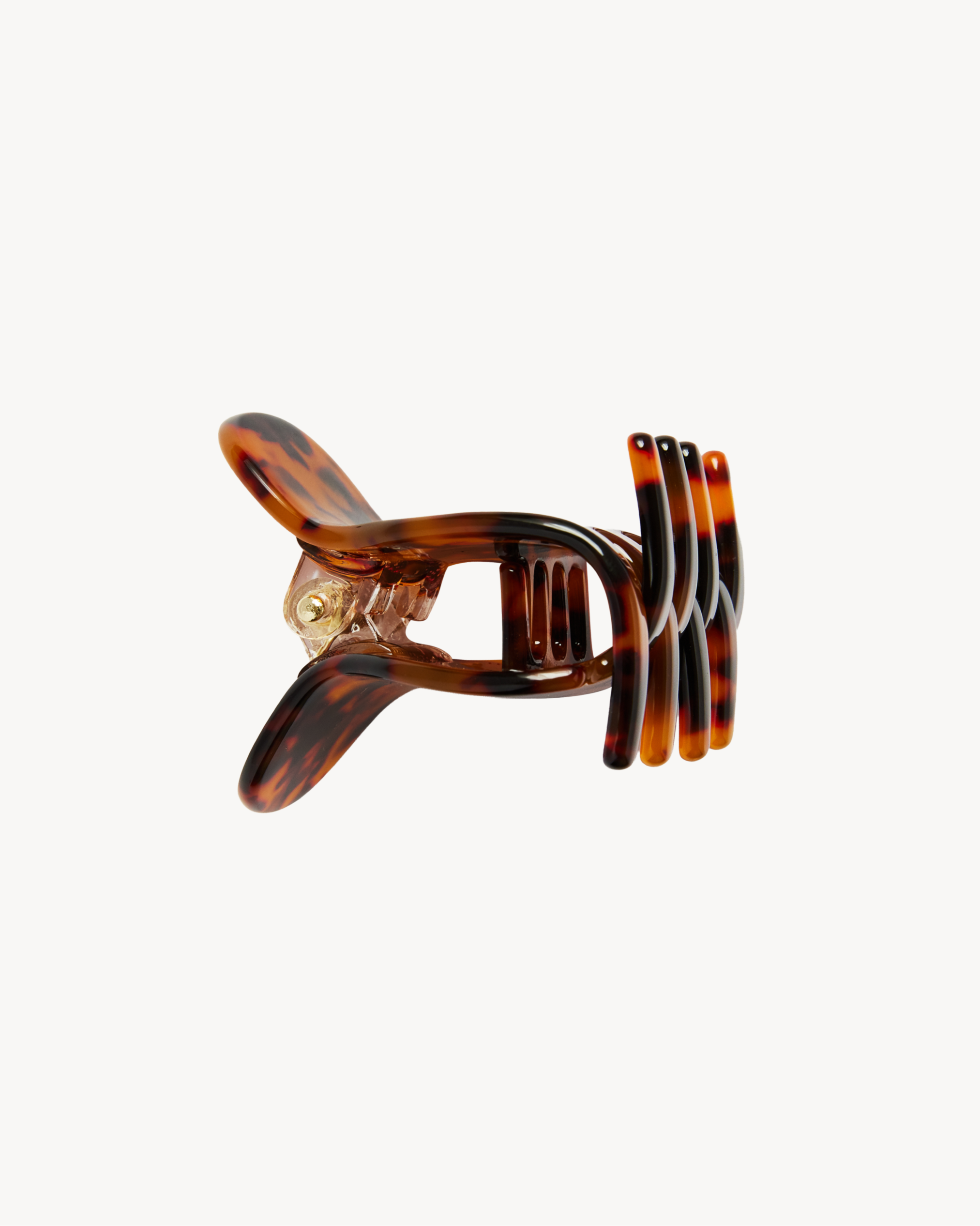 Tortoiseshell VESITIA midi claw clip on a white background