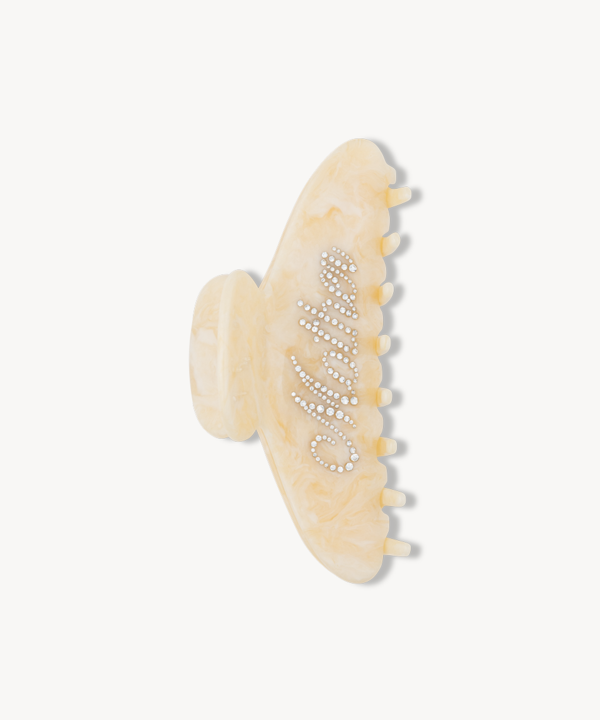 Beige VESITIA hair claw clip for mums with textured design on a white background
