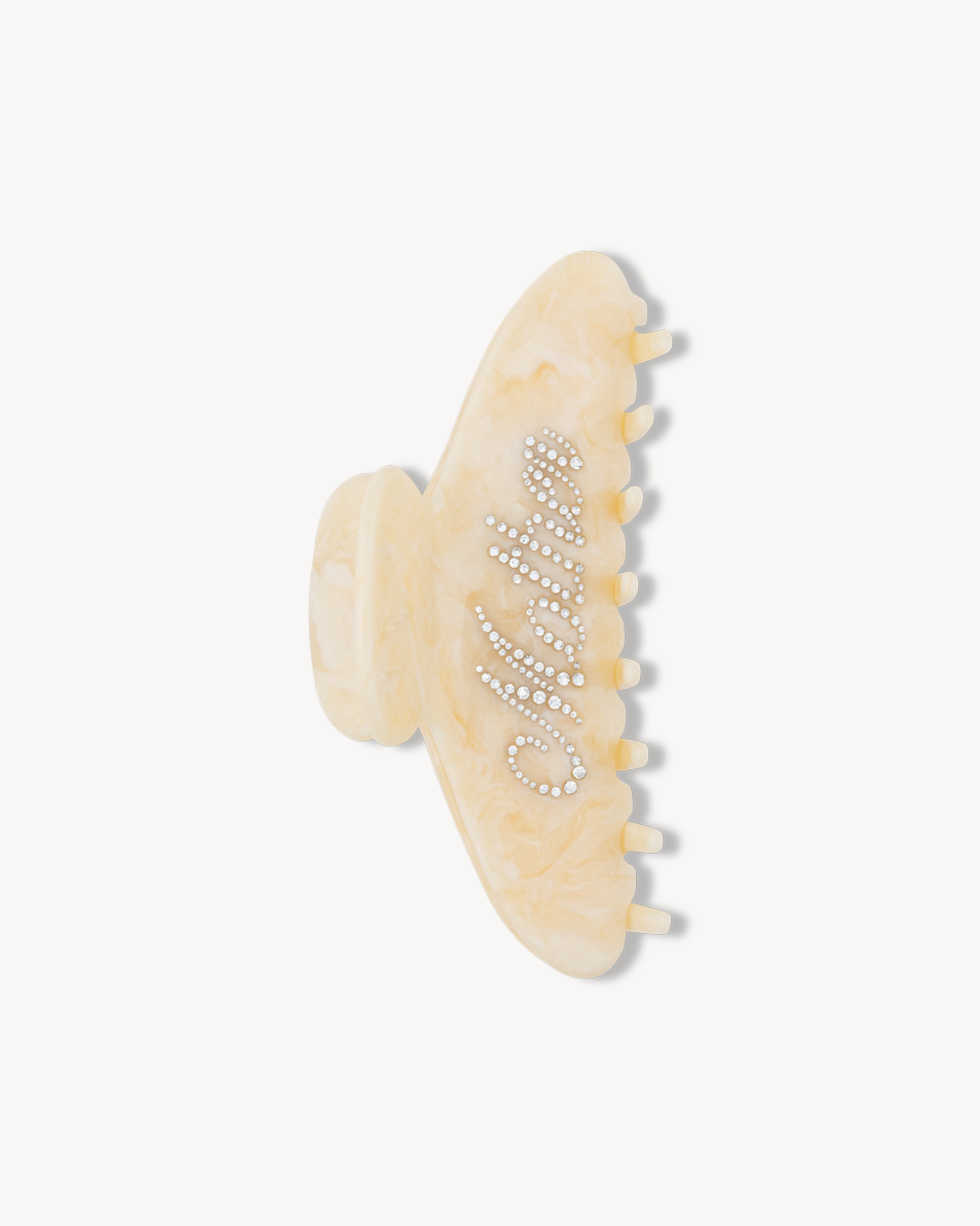 Beige VESITIA hair claw clip for mums with textured design on a white background
