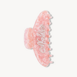 Pink VESITIA claw clip for mums on a white background