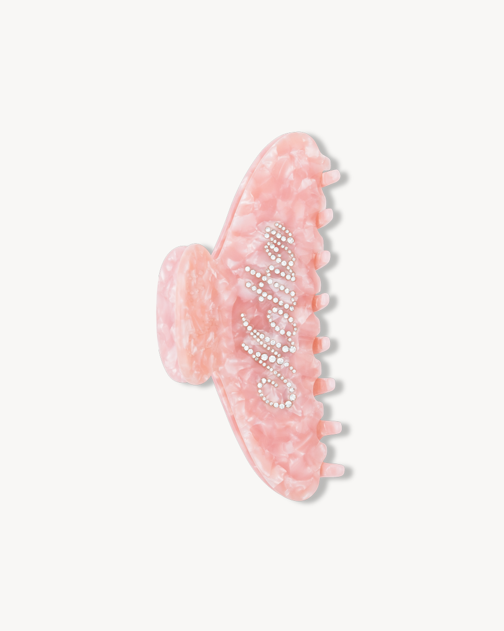 Pink VESITIA claw clip for mums on a white background