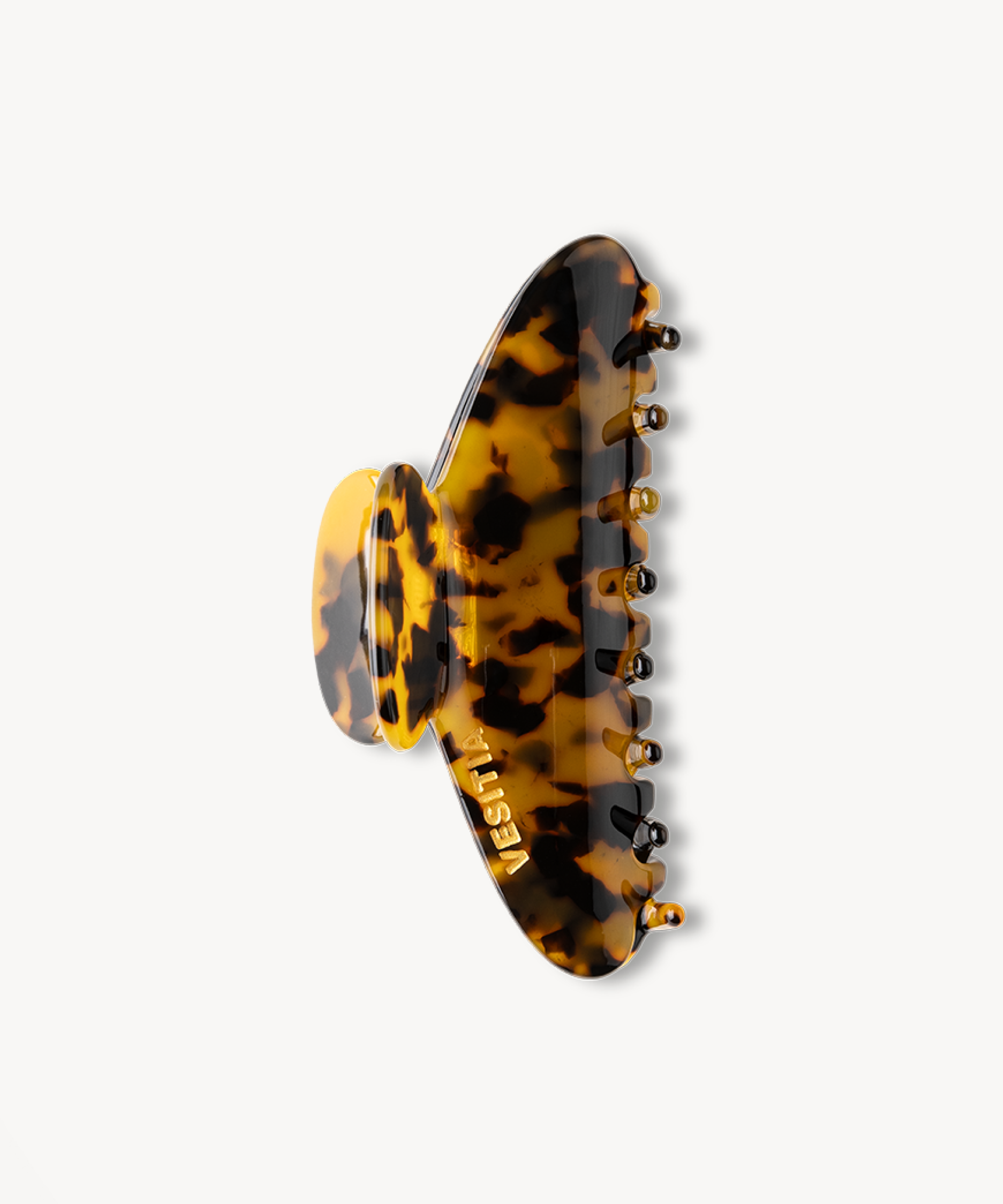 VESITIA tortoiseshell patterned hair clip on a white background