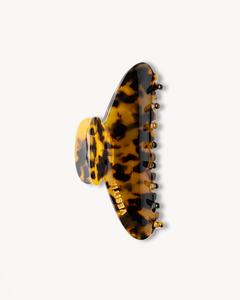 VESITIA tortoiseshell patterned hair clip on a white background
