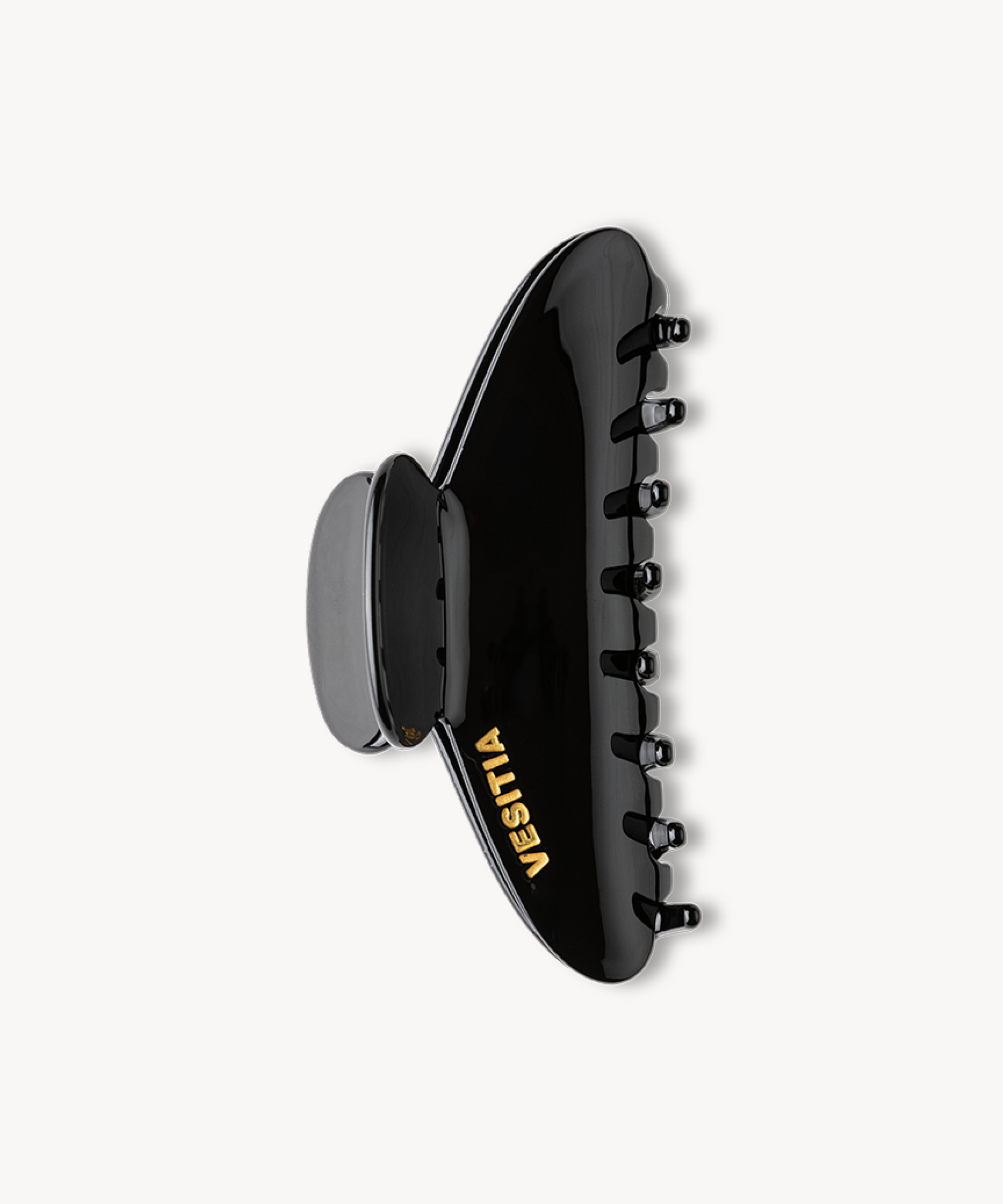 Black VESITIA hair claw clip on a white background