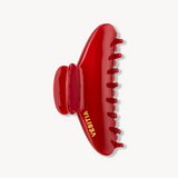 Red VESITIA claw clip on a white background