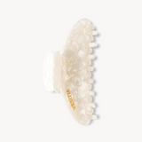White VESITIA hair claw clip on a white background