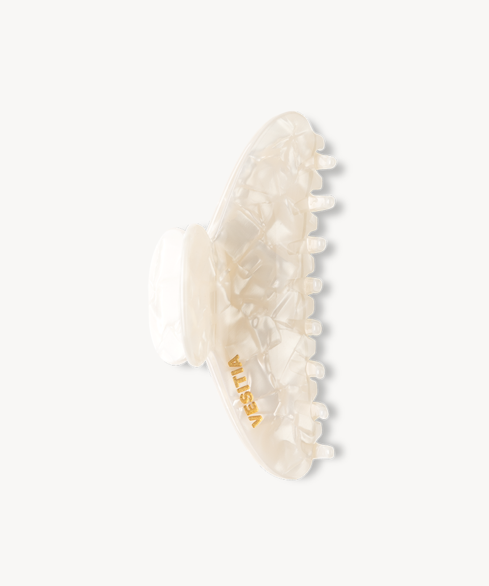 White VESITIA hair claw clip on a white background