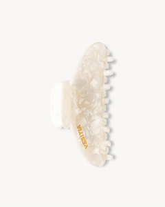 White VESITIA hair claw clip on a white background